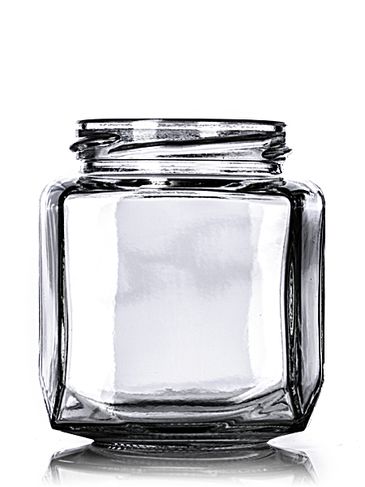 9 oz clear glass oval hex-shaped jar with 63TW neck finish