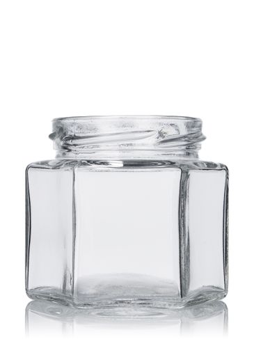 4 oz clear glass hex-shaped jar with 58TW neck finish